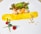A gourmet dish is artistically presented on a white plate. Scallops, garnished with a bright orange sauce, are accompanied by a leafy green salad. A smear of vibrant yellow sauce runs across the plate, and scattered pine nuts add texture. Two red raspberries and a blueberry are positioned artfully alongside two thin green chives.