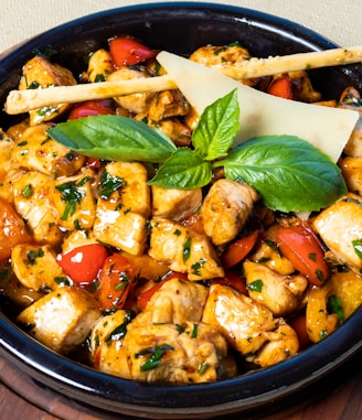 cooked food on black ceramic bowl