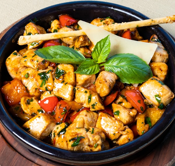 cooked food on black ceramic bowl