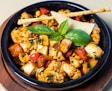 cooked food on black ceramic bowl