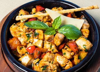 cooked food on black ceramic bowl