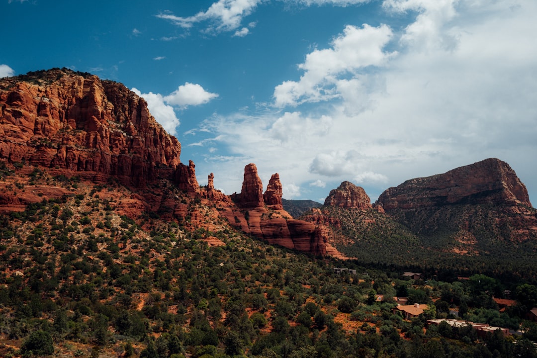 brown rock formation under blue sky during daytime