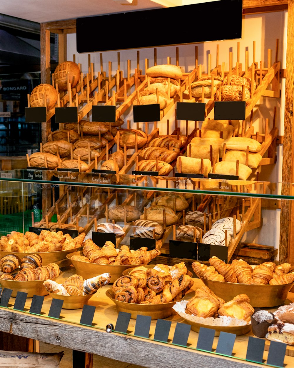 brown bread on clear glass display counter