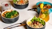 A healthy meal spread on a table, featuring fresh fruits and vegetables.