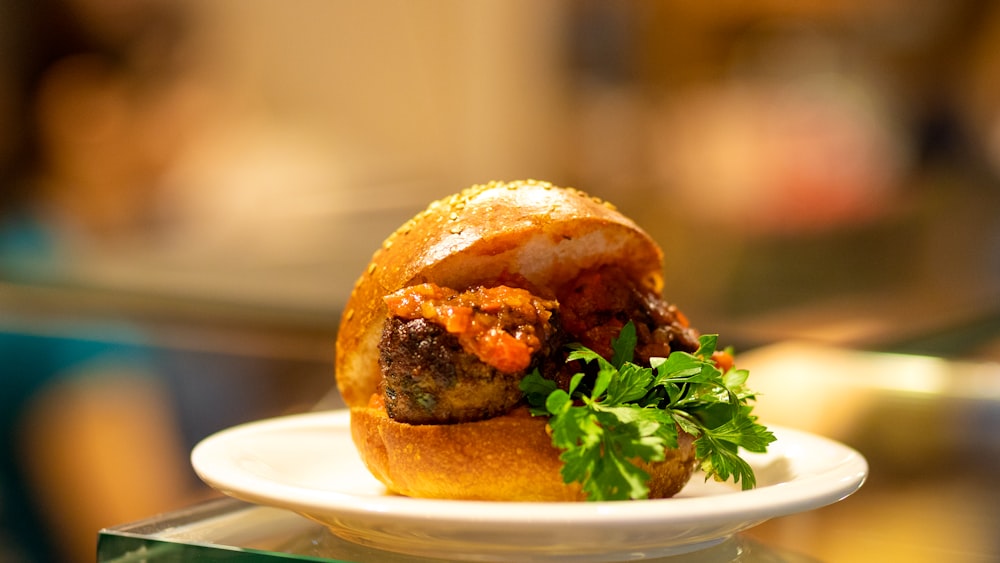 burger on white ceramic plate