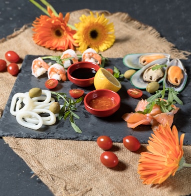 sliced fruits on white ceramic bowl