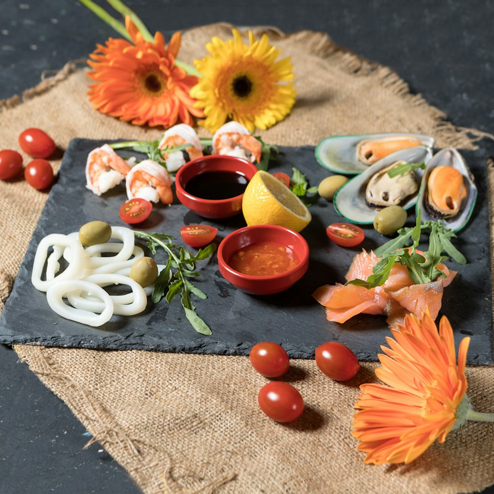 sliced fruits on white ceramic bowl