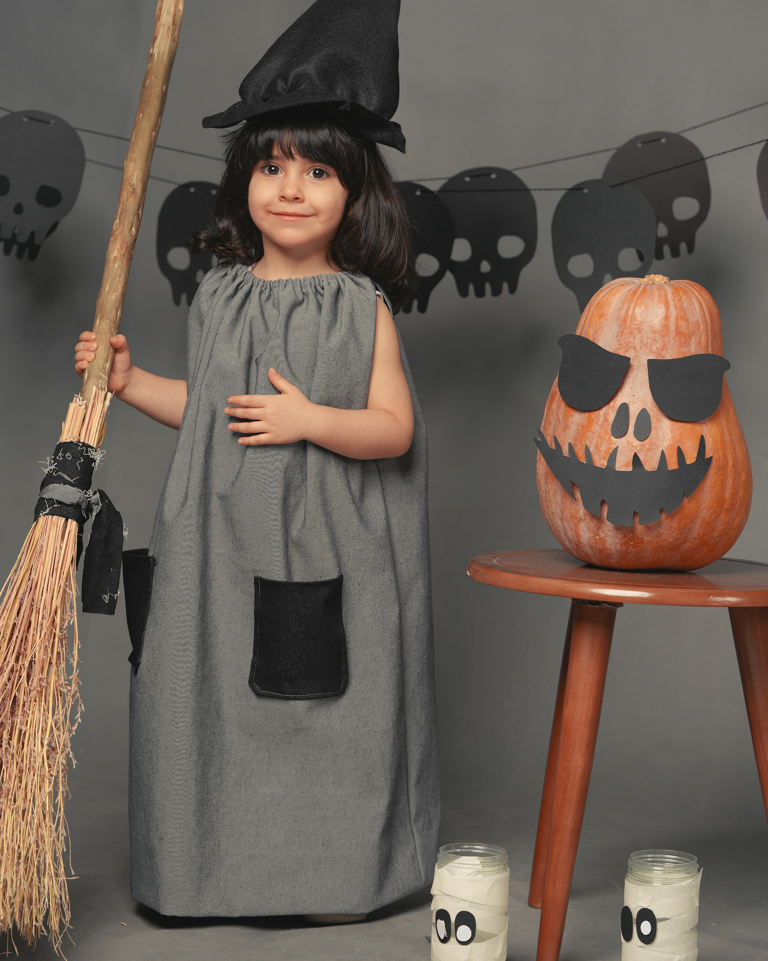 jack o lantern on brown wooden seat