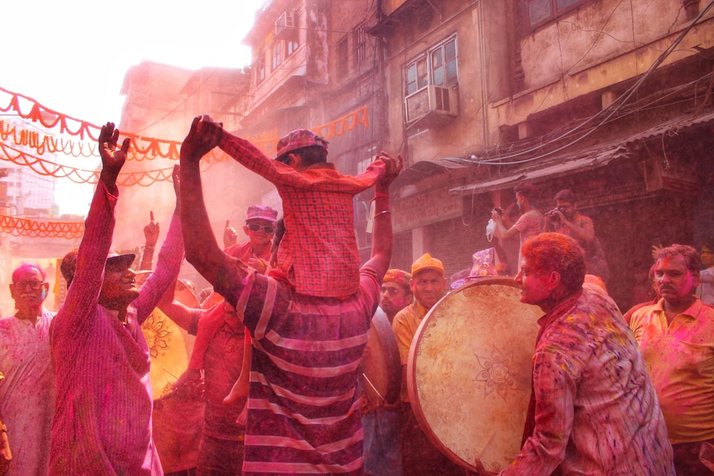 people dancing on street during daytime