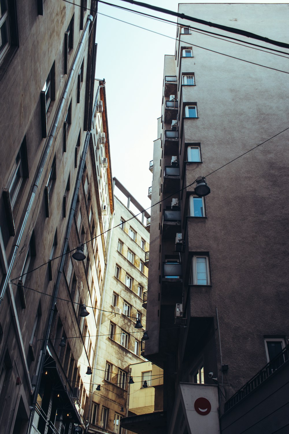 low angle photography of brown concrete building during daytime