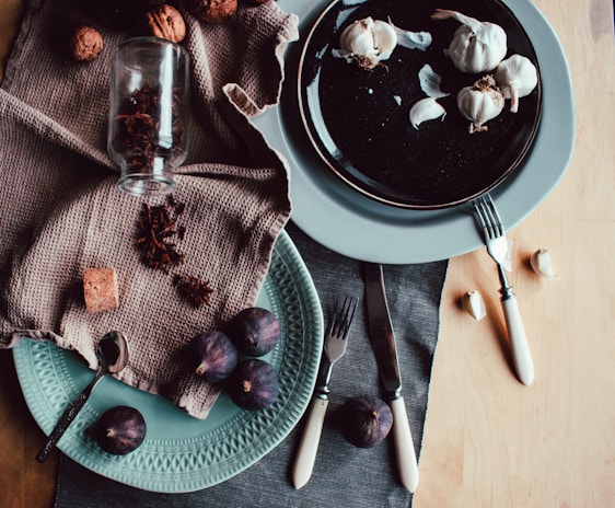 A rustic table setting with fudge and fresh ingredients around.