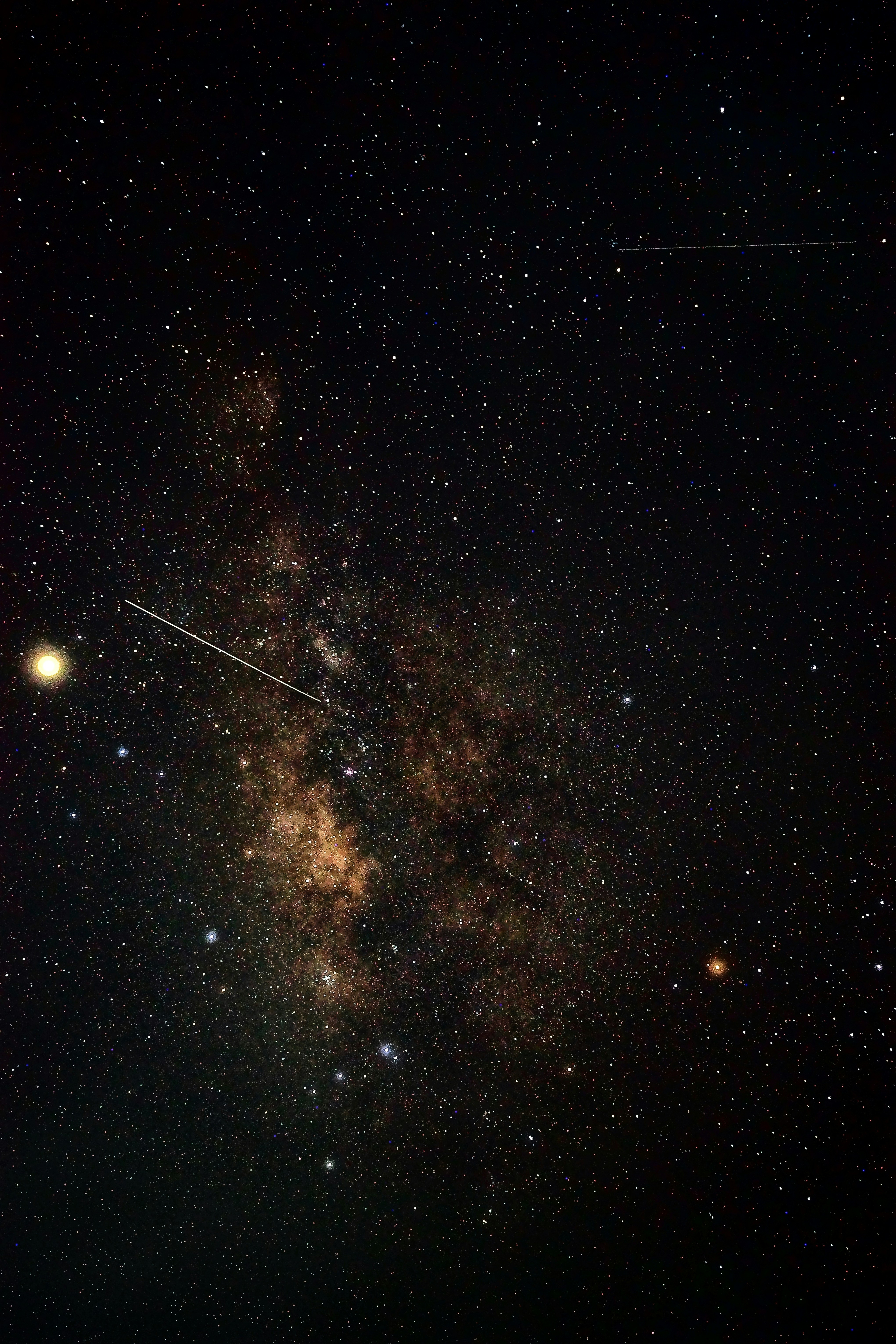 Stunning night sky with milky way and shooting star