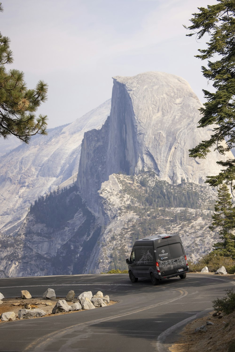 black suv on road near mountain