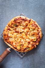 pizza on brown wooden table