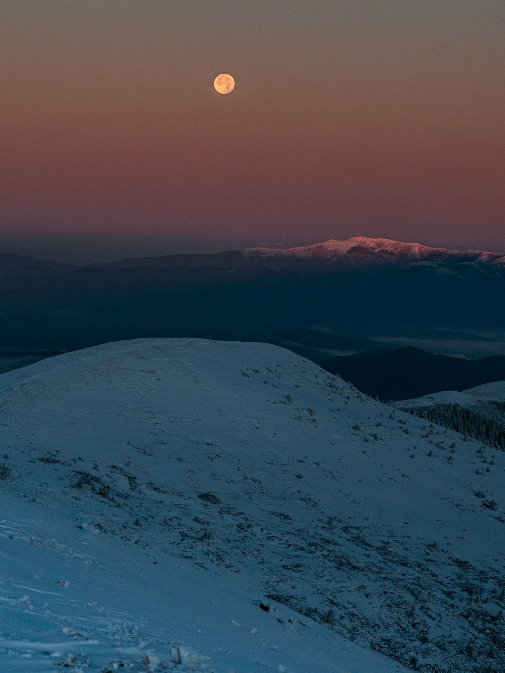 snow covered mountain under blue sky during daytime