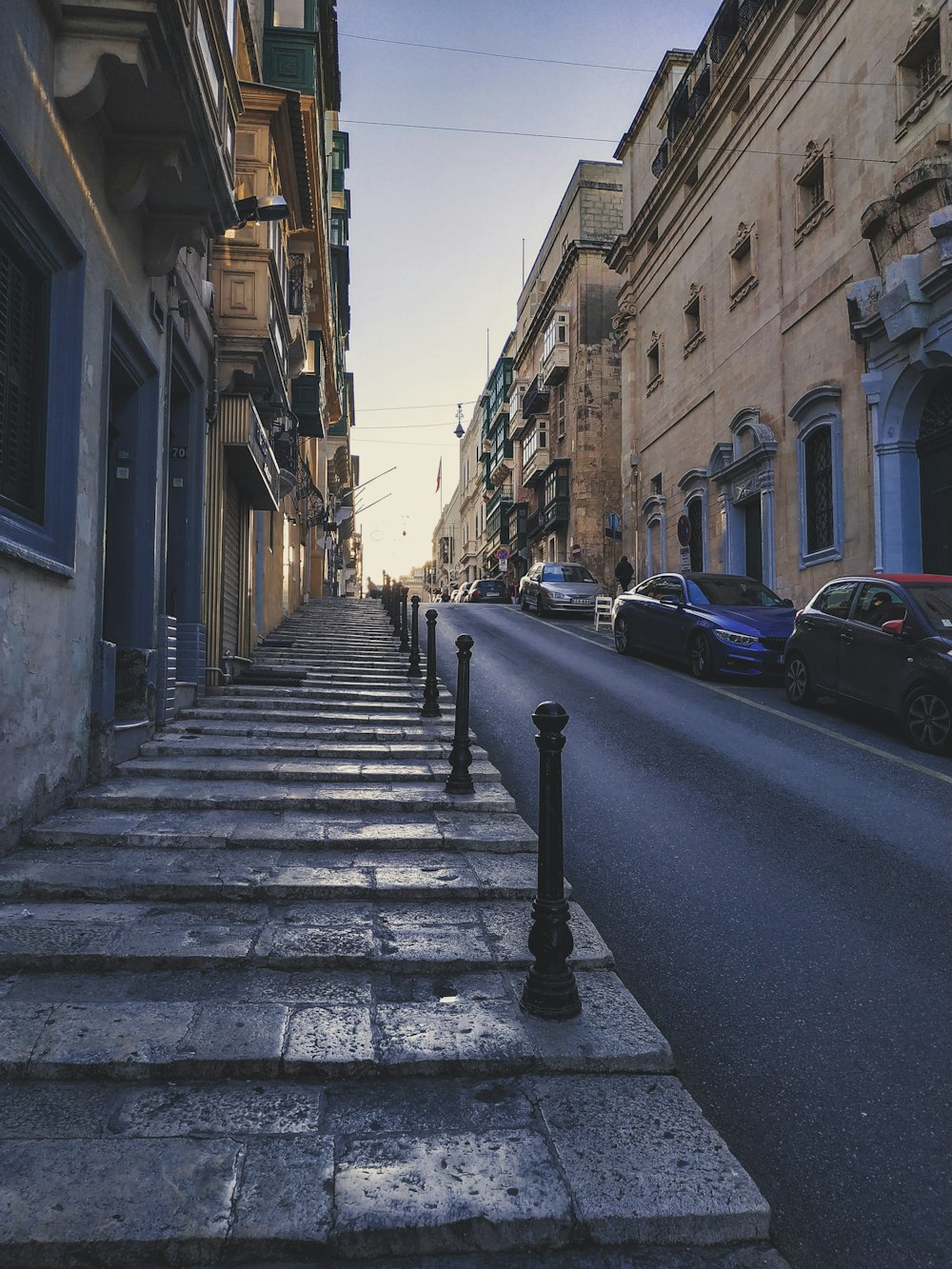 cars parked on the side of the road during daytime