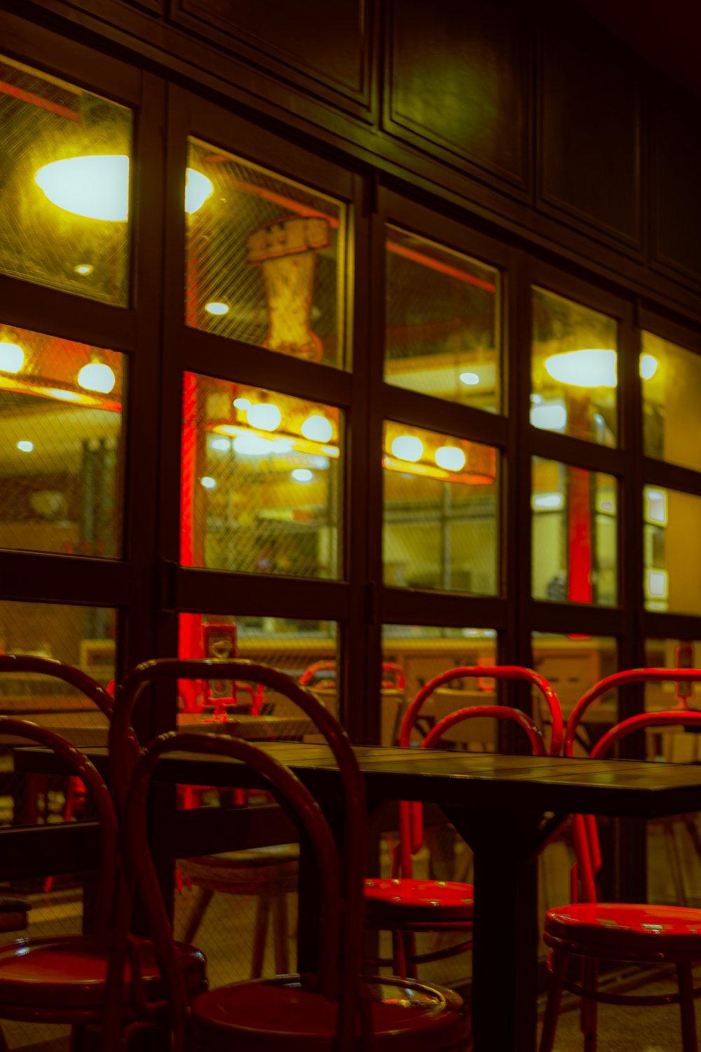 red chairs and tables inside restaurant