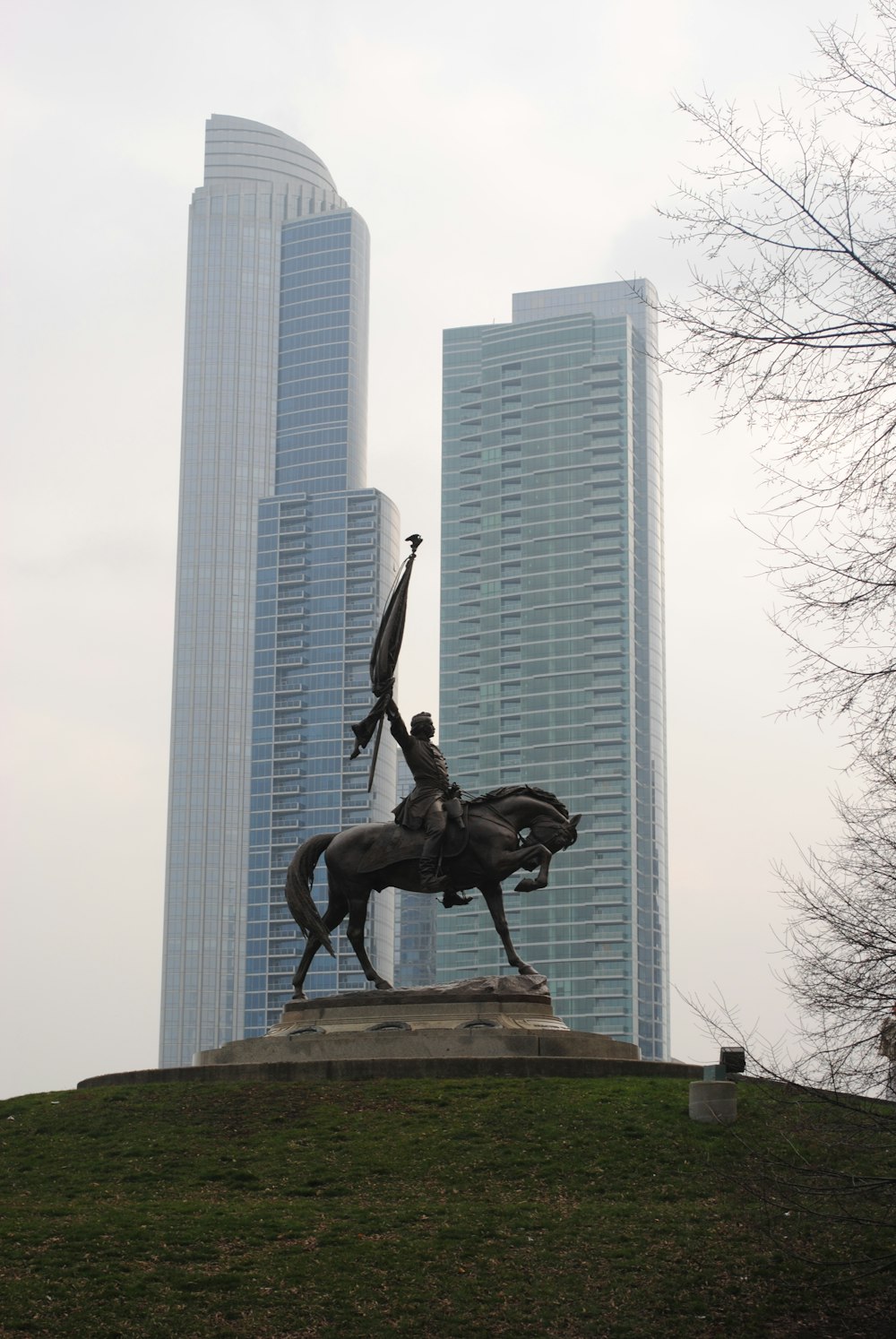 black statue of man riding horse