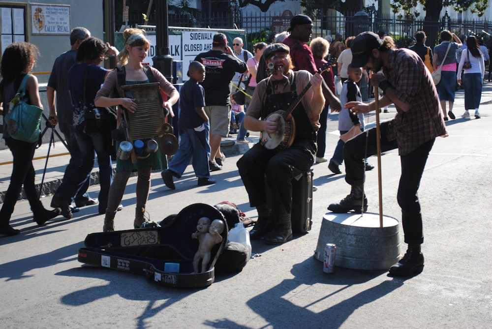 people standing on gray concrete floor during daytime