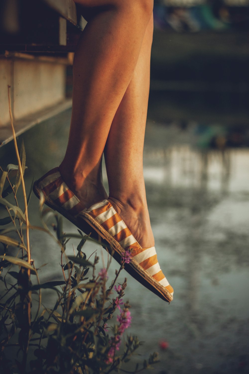 woman in brown leather peep toe heeled sandals