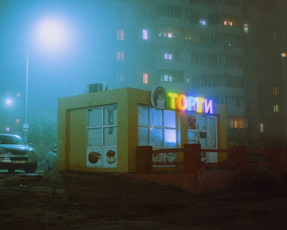 white and blue concrete building during nighttime