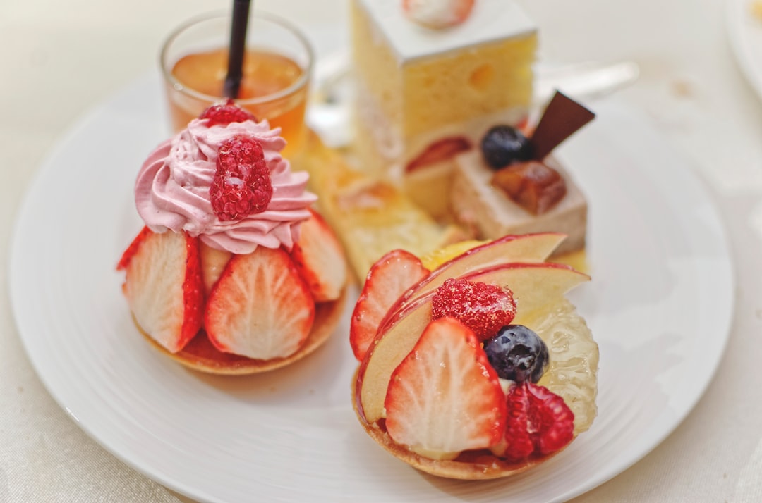 strawberry and strawberry on white ceramic plate