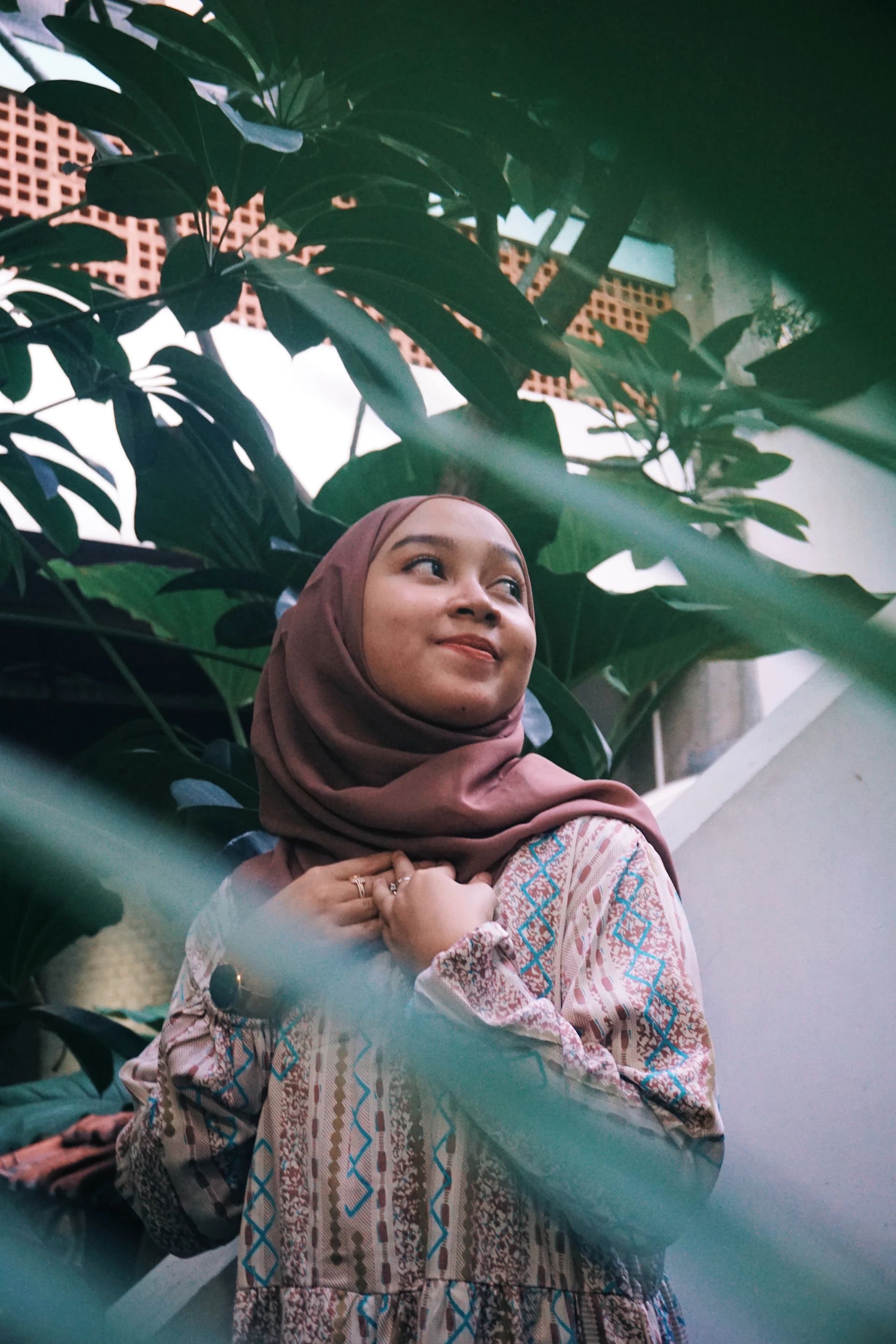 woman holding dried flower