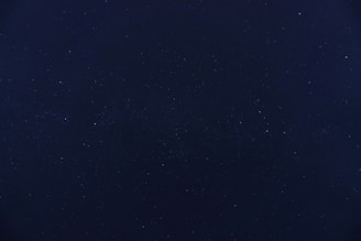 blue sky with stars during night time