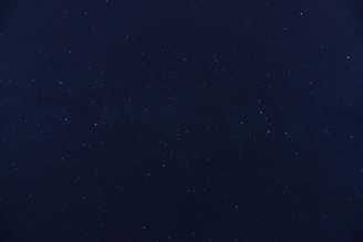 blue sky with stars during night time