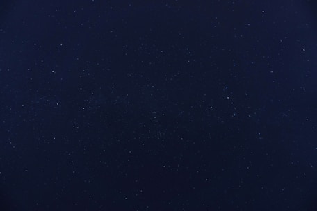 blue sky with stars during night time