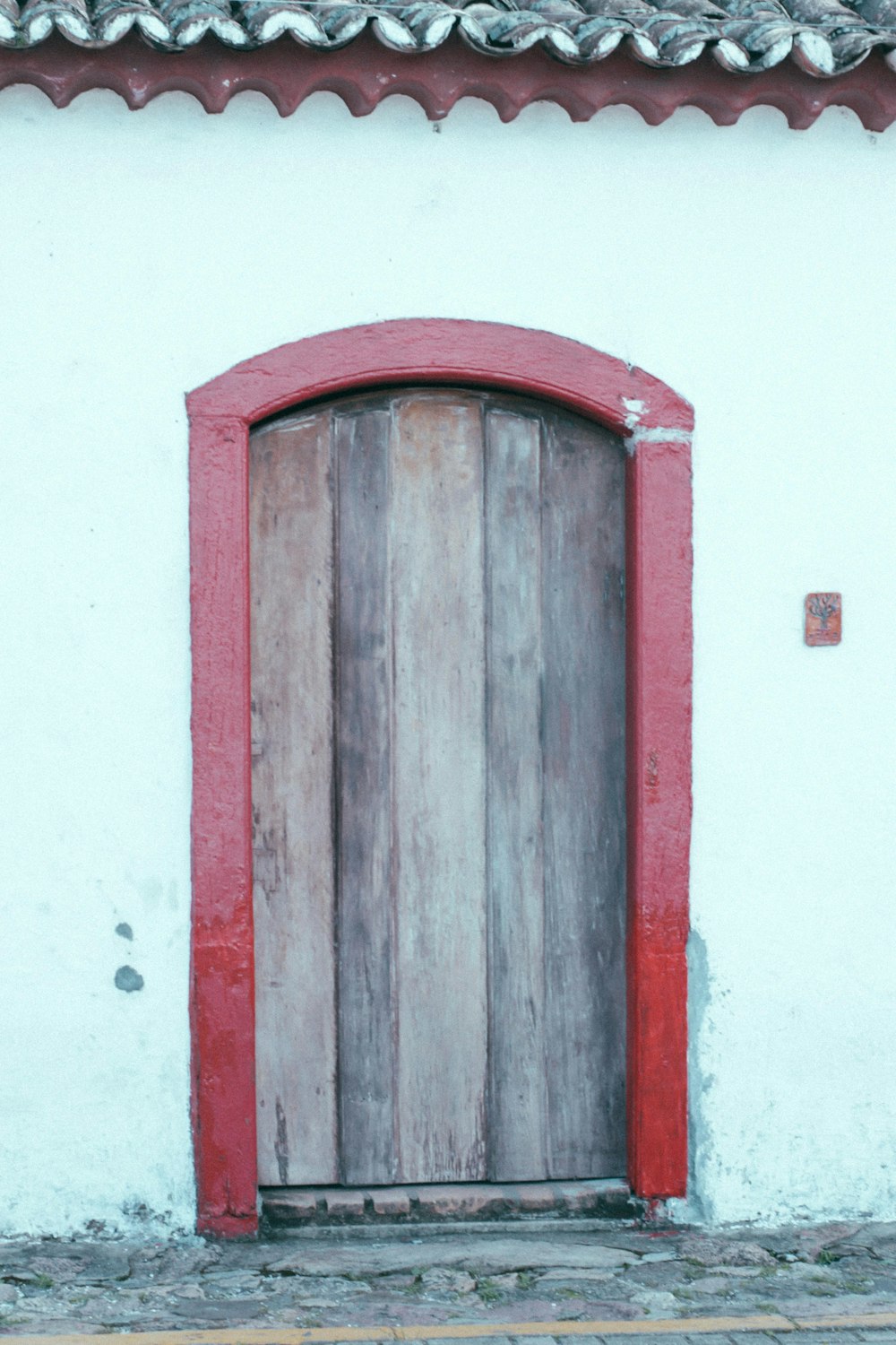 red and brown wooden door