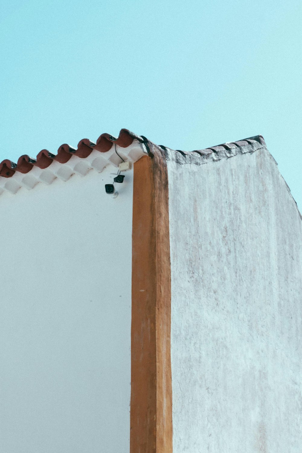 white textile on brown wooden frame