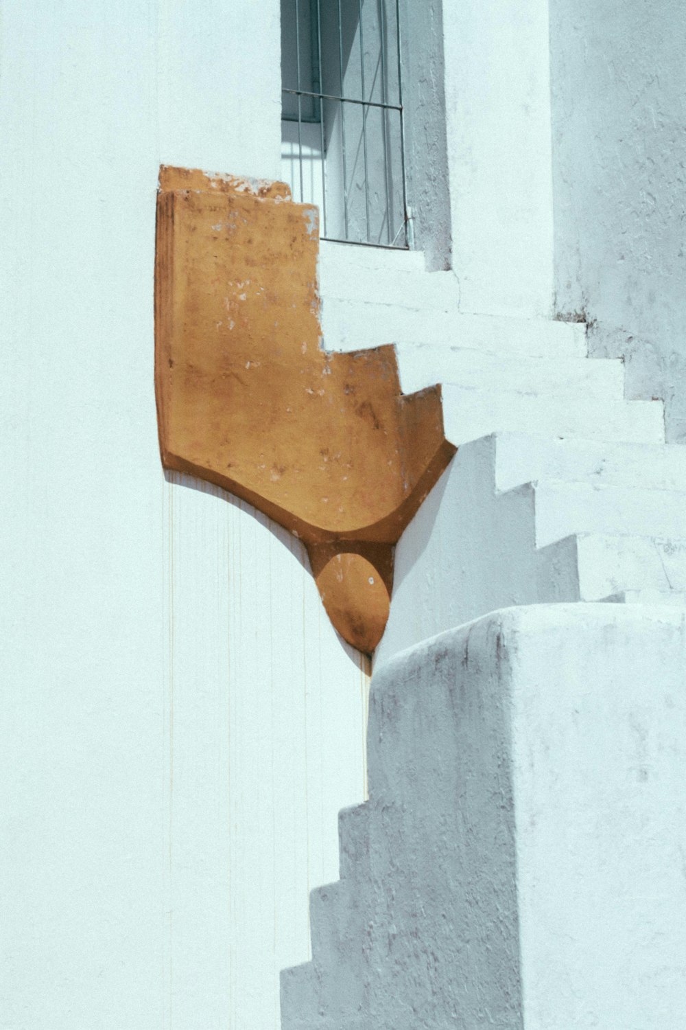 white and brown concrete staircase