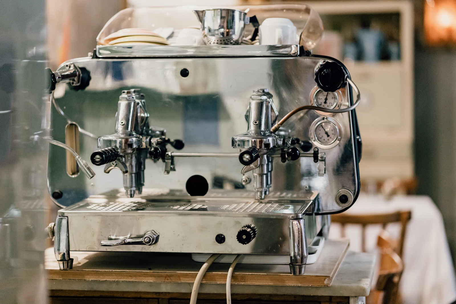 An old-fashioned espresso machine in a Roman trattoria