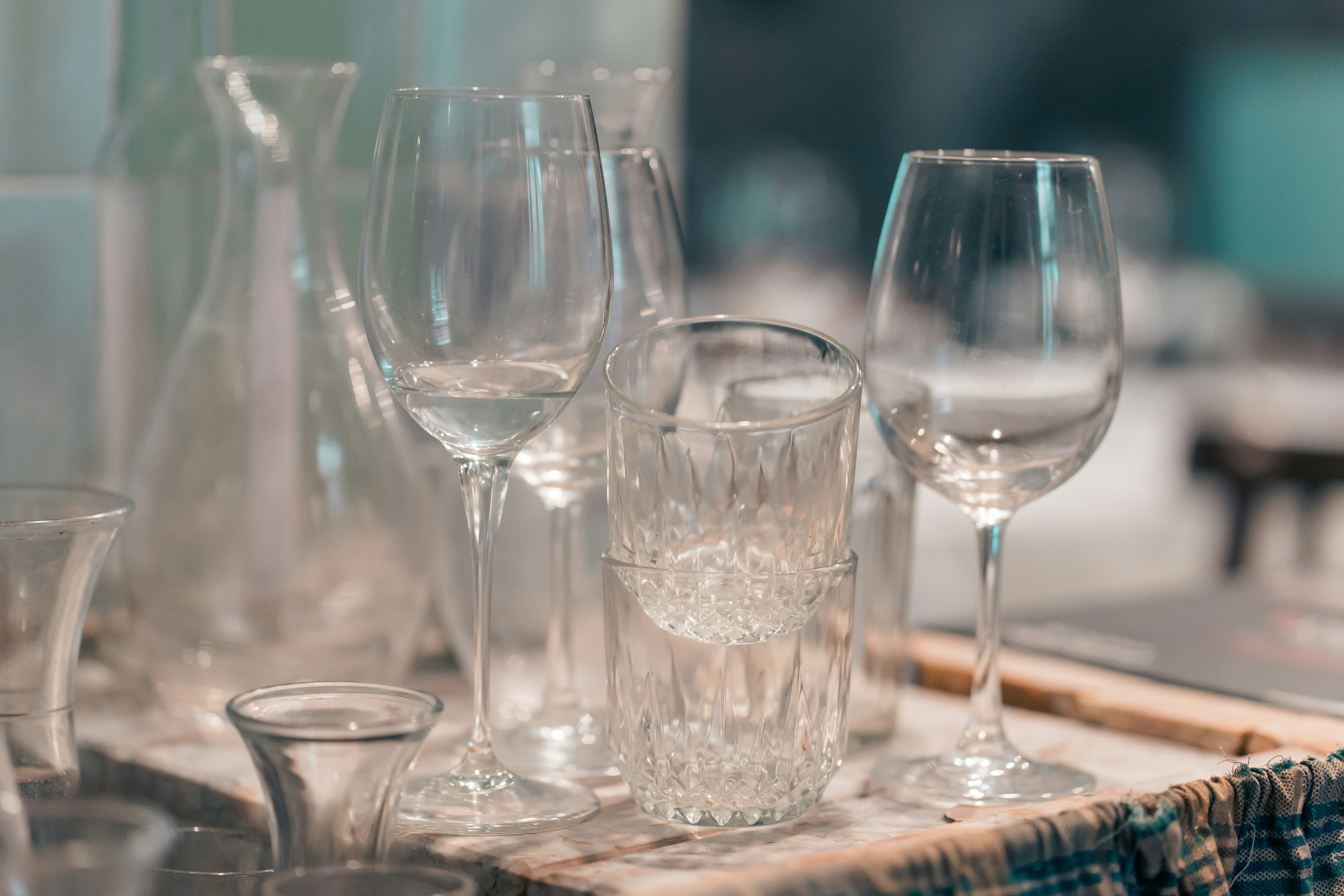 clear wine glasses on brown wooden table