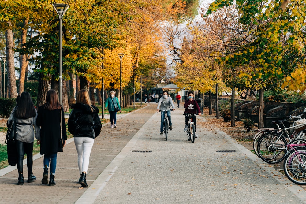 people walking on sidewalk during daytime