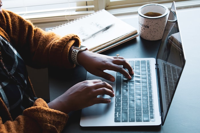 A woman working from her laptop at home — the Circle is fully online