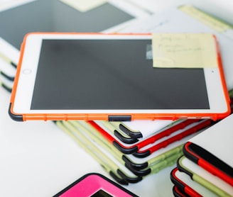 white ipad on white table