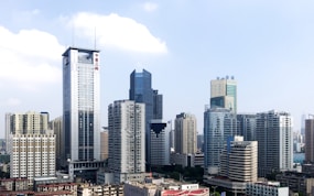 white and gray high rise buildings during daytime