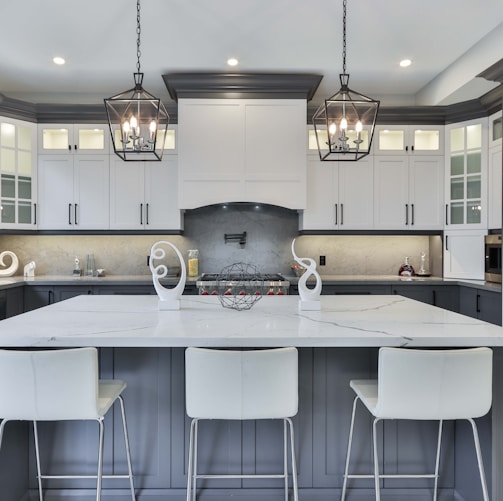 white and silver kitchen sink