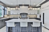 white and silver kitchen sink