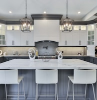 white and silver kitchen sink