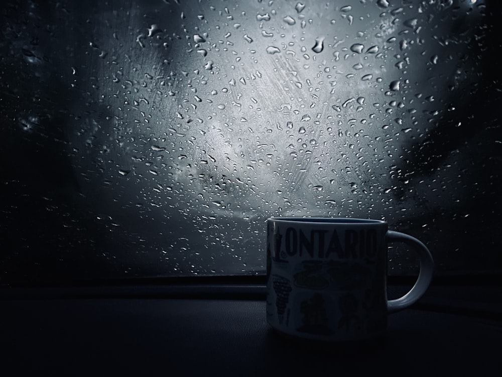 white ceramic mug on table