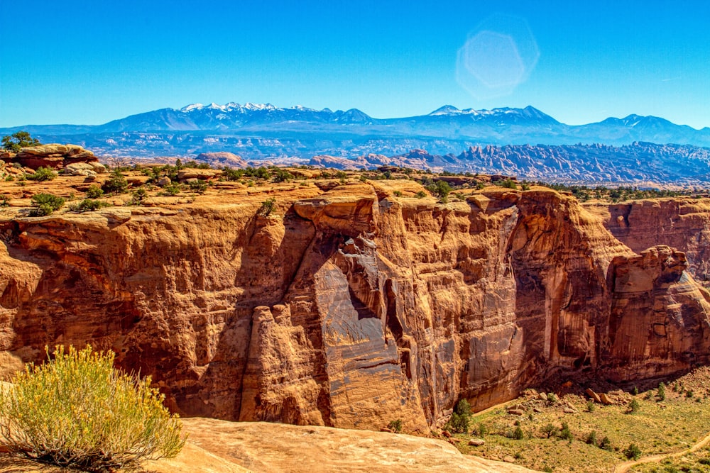 brown rock formation under blue sky during daytime