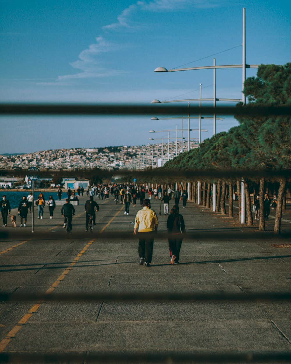 people walking on the beach during daytime