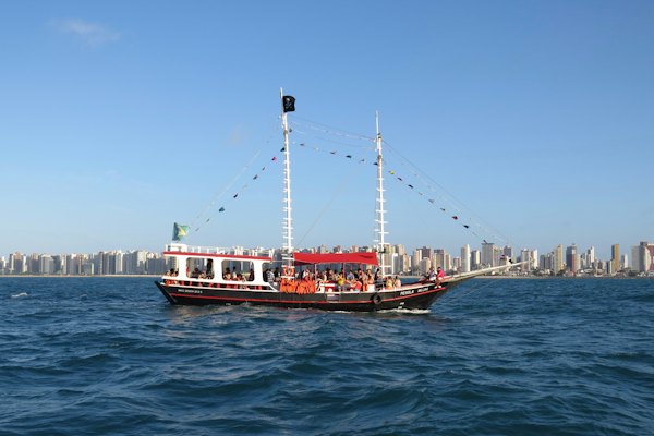 Red and white ship on sea during daytime — Fortaleza, Brazil