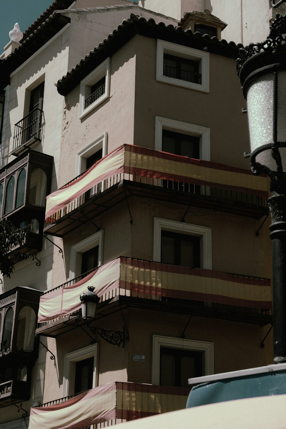 a tall building with a clock on the top of it