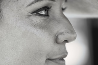 womans face in close up photography