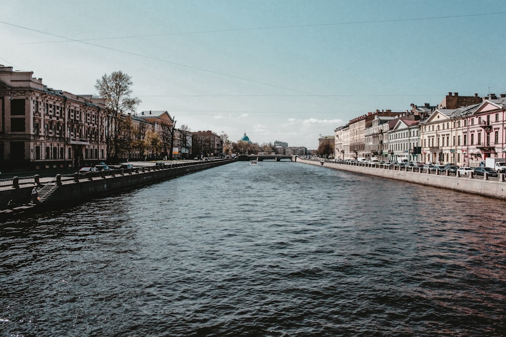 body of water near buildings during daytime