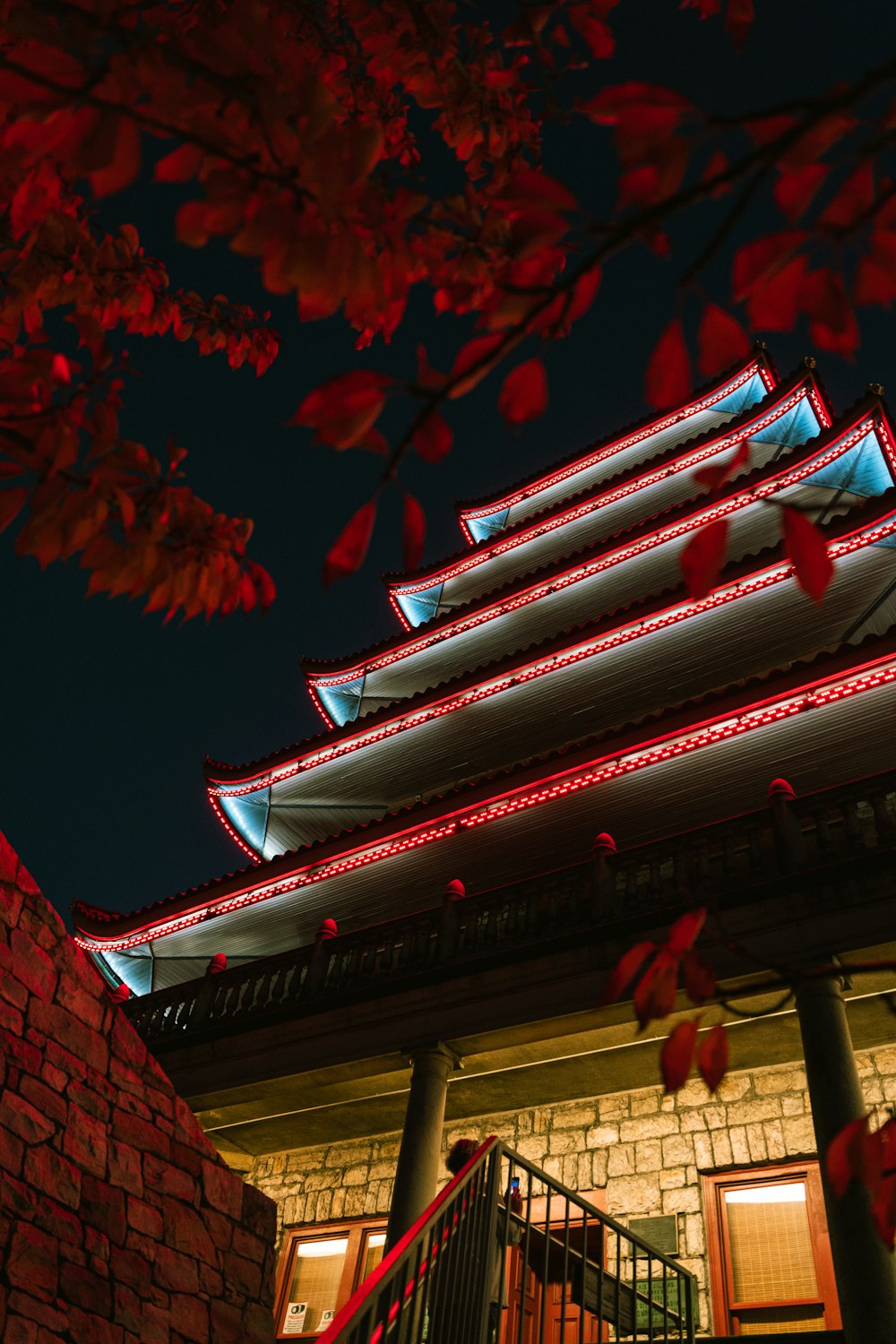 red and white temple during night time